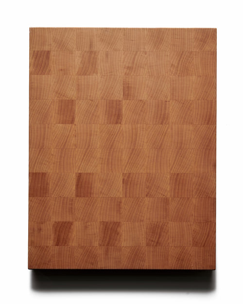 Maple end-grain cutting board by Maison Liverani showing smooth, plain surface